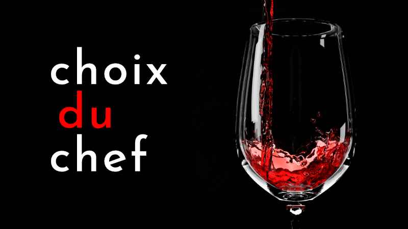 Glass of red wine next to Choix du Chef logo